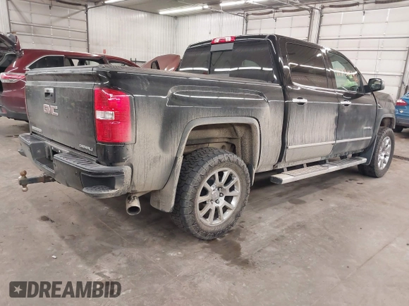 2015 GMC Sierra 1500 Denali with VIN 3GTU2WEC7FG129925, listed as a IAAI auction lot 41731496 with 165,168 mi miles. Bid and sale history available at carsss.com. Image 4.