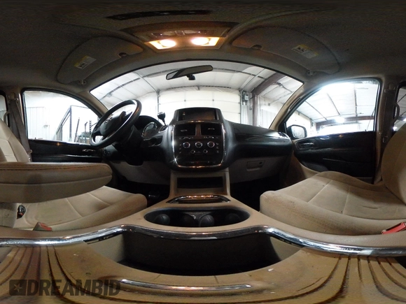 2014 Dodge Grand Caravan SXT with VIN 2C4RDGCGXER154709, listed as a IAAI auction lot 41117603 with 214,872 mi miles and . Bid and sale history available at DreamBid. Image 18.