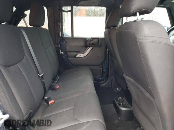 2016 Jeep Wrangler Unlimited Sport with VIN 1C4BJWDG2GL305086, listed as a Copart auction lot 48212105 with 113,001 mi miles and Salvage Title. Bid and sale history available at DreamBid. Image 11.