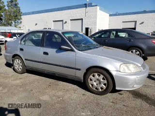 1999 Honda Civic LX with VIN 2HGEJ6571XH552867, listed as a Copart auction lot 81715654 with 234,544 mi miles and Salvage Title. Bid and sale history available at DreamBid. Image 4.