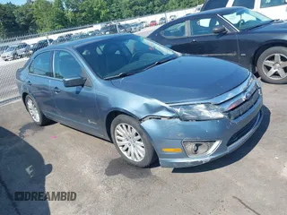 2011 Ford Fusion Hybrid z VIN 3FADP0L3XBR217504, wystawiony jako IAAI lot #42633083 z przebiegiem 166 274 mil mil oraz . Historia ofert i sprzedaży dostępna na DreamBid. Obrazek 1.