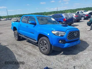 2021 Toyota Tacoma SR z VIN 3TMCZ5AN8MM374398, wystawiony jako IAAI lot #42297138 z przebiegiem 87 205 mil mil oraz . Historia ofert i sprzedaży dostępna na DreamBid. Obrazek 1.