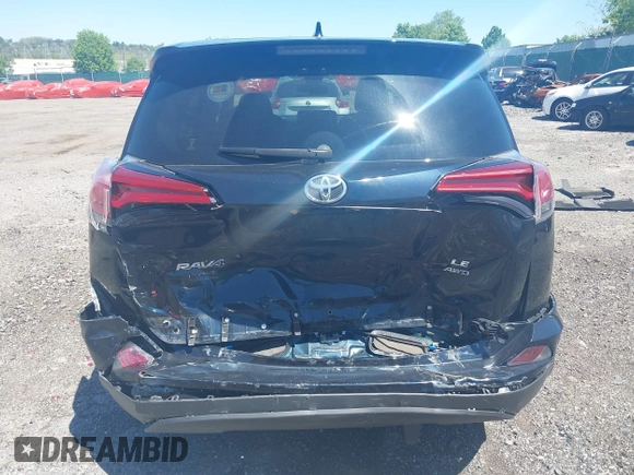 2017 Toyota RAV4 LE with VIN JTMBFREV8HJ168975, listed as a IAAI auction lot 42139354 with 91,394 mi miles and . Bid and sale history available at DreamBid. Image 6.