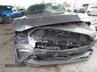 2022 Ford Mustang EcoBoost with VIN 1FA6P8TH5N5142558, listed as a IAAI auction lot 42025156 with 24,069 mi miles and . Bid and sale history available at DreamBid. Image 6.