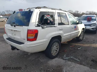 2003 Jeep Grand Cherokee Limited with VIN 1J4GW58N73C569872, listed as a IAAI auction lot 41461416 with 149,185 mi miles. Bid and sale history available at carsss.com. Image 4.