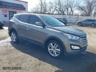 2013 Hyundai Santa Fe 2.0T Sport with VIN 5XYZWDLA1DG003779, listed as a IAAI auction lot 41761431 with 127,895 mi miles. Bid and sale history available at carsss.com. Image 1.