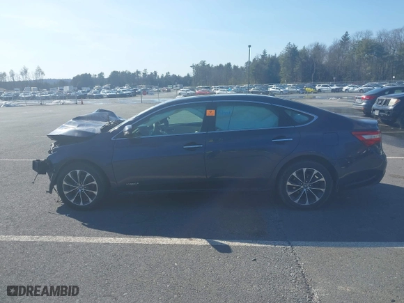 2016 Toyota Avalon Hybrid XLE Premium with VIN 4T1BD1EB2GU052127, listed as a IAAI auction lot 41737260 with 266,841 mi miles. Bid and sale history available at carsss.com. Image 15.
