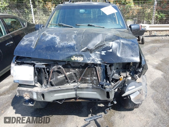 1997 Jeep Grand Cherokee Limited with VIN 1J4GZ78Y1VC658515, listed as a IAAI auction lot 41897266 with 164,033 mi miles and . Bid and sale history available at DreamBid. Image 6.