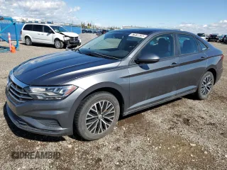 2019 Volkswagen Jetta SEL z VIN 3VWE57BU5KM035498, wystawiony jako Copart lot #57970635 z przebiegiem 241 970 mil mil oraz Czysty tytuł • Clean title. Historia ofert i sprzedaży dostępna na DreamBid. Obrazek 1.