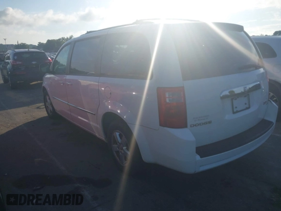 2010 Dodge Grand Caravan SXT z VIN 2D4RN5D10AR200217, wystawiony jako IAAI lot #42540925 z przebiegiem 239 247 mil mil oraz . Historia ofert i sprzedaży dostępna na DreamBid. Obrazek 3.