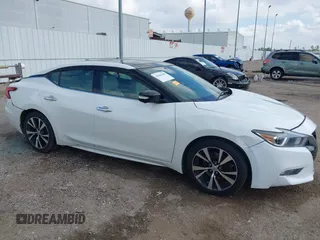 2016 Nissan Maxima SL z VIN 1N4AA6AP8GC403657, wystawiony jako IAAI lot #41506188 z przebiegiem 97 935 mil mil oraz . Historia ofert i sprzedaży dostępna na DreamBid. Obrazek 13.