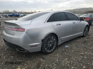 2013 Lincoln MKZ z VIN 3LN6L2GKXDR817613, wystawiony jako Copart lot #50604405 z przebiegiem Nie podano mil oraz Szkoda całkowita • Salvage title. Historia ofert i sprzedaży dostępna na DreamBid. Obrazek 3.