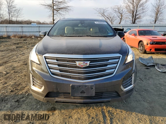 2017 Cadillac XT5 Luxury AWD z VIN 1GYKNDRS2HZ122057, wystawiony jako Copart lot #41686825 z przebiegiem 136 844 mil mil oraz Szkody całkowita. Historia ofert i sprzedaży dostępna na DreamBid. Obrazek 5.