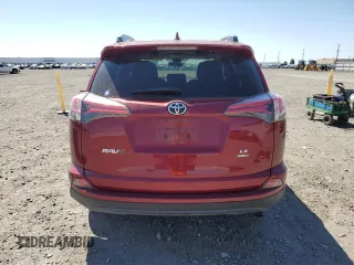 2018 Toyota RAV4 LE with VIN 2T3BFREV9JW852635, listed as a Copart auction lot 59807005 with 60,519 mi miles and Salvage title. Bid and sale history available at DreamBid. Image 6.