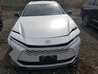 2025 Toyota Crown XLE with VIN JTDACAAJ3S3001296, listed as a Copart auction lot 54757035 with 12,003 mi miles and Salvage title. Bid and sale history available at DreamBid. Image 5.