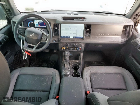 2024 Ford Bronco Big Bend with VIN 1FMDE7BH7RLB38639, listed as a Copart auction lot 57882975 with 1,519 mi miles and Salvage title. Bid and sale history available at DreamBid. Image 8.