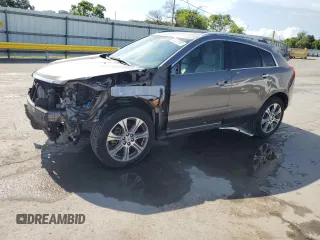 2012 Cadillac SRX Performance Collection с VIN 3GYFNBE30CS513685, выставлен на аукционе Copart как лот 64520995 с пробегом 156 490 миль миль и Списание • Salvage title. История ставок и продаж доступна на DreamBid. Изображение 1.