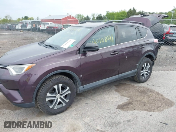 2018 Toyota RAV4 LE with VIN 2T3BFREV9JW771845, listed as a IAAI auction lot 42108641 with 127,394 mi miles. Bid and sale history available at carsss.com. Image 2.