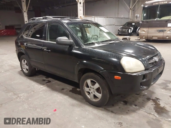 2006 Hyundai Tucson GL with VIN KM8JM12B26U325338, listed as a IAAI auction lot 41809578 with 127,210 mi miles. Bid and sale history available at carsss.com. Image 1.