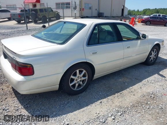 2000 Cadillac Seville Touring STS z VIN 1G6KY5495YU145937, wystawiony jako IAAI lot #42330143 z przebiegiem 217 894 mil mil oraz . Historia ofert i sprzedaży dostępna na DreamBid. Obrazek 4.