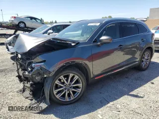2021 Mazda CX-9 Carbon Edition z VIN JM3TCADYXM0519399, wystawiony jako Copart lot #52714565 z przebiegiem 72 765 mil mil oraz Szkoda całkowita • Salvage title. Historia ofert i sprzedaży dostępna na DreamBid. Obrazek 1.