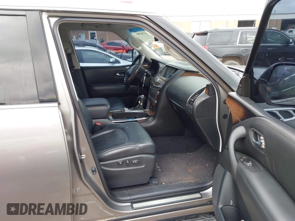 2013 Infiniti QX56 with VIN JN8AZ2NEXD9060450, listed as a IAAI auction lot 42388986 with 124,129 mi miles and . Bid and sale history available at DreamBid. Image 5.