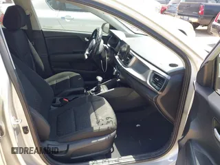 2023 Kia Rio S z VIN 3KPA24AD6PE600384, wystawiony jako IAAI lot #42003099 z przebiegiem 27 001 mil mil oraz . Historia ofert i sprzedaży dostępna na DreamBid. Obrazek 5.