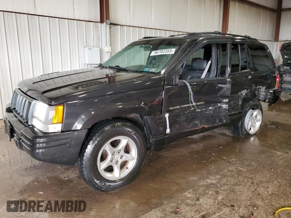 1998 Jeep Grand Cherokee Limited z VIN 1J4GZ88Z0WC276394, wystawiony jako Copart lot #46702355 z przebiegiem 144 232 mil mil oraz Szkoda całkowita • Salvage title. Historia ofert i sprzedaży dostępna na DreamBid. Obrazek 1.