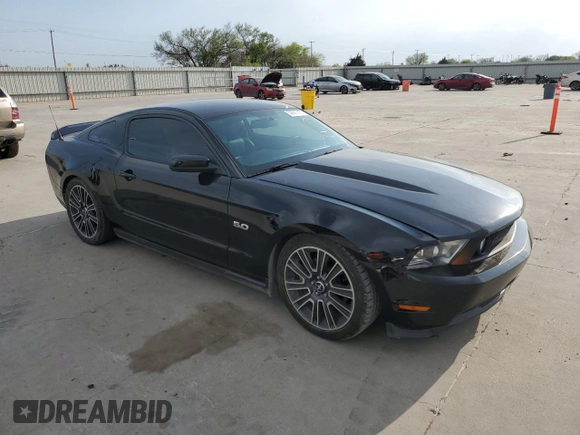 2012 Ford Mustang GT Premium with VIN 1ZVBP8CF0C5251771, listed as a Copart auction lot 50801515 with 104,833 mi miles and Salvage Title. Bid and sale history available at DreamBid. Image 4.