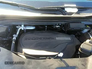 2021 Honda Pilot Touring 7-Passenger with VIN 5FNYF5H69MB000710, listed as a IAAI auction lot 43081838 with 91,899 mi miles and . Bid and sale history available at DreamBid. Image 19.