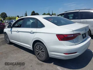 2021 Volkswagen Jetta S z VIN 3VWC57BU4MM037088, wystawiony jako IAAI lot #42087111 z przebiegiem 82 728 mil mil oraz . Historia ofert i sprzedaży dostępna na DreamBid. Obrazek 14.