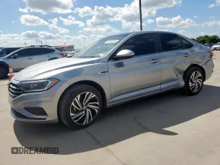 2021 Volkswagen Jetta SEL z VIN 3VWE57BUXMM088877, wystawiony jako Copart lot #62319195 z przebiegiem 31 604 mil mil oraz Szkoda całkowita • Salvage title. Historia ofert i sprzedaży dostępna na DreamBid. Obrazek 1.