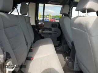 2007 Jeep Wrangler Unlimited Sahara with VIN 1J4GA59197L121262, listed as a Copart auction lot 61551685 with 233,309 mi miles and Clean title. Bid and sale history available at DreamBid. Image 11.