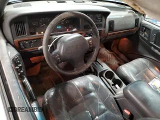 1997 Jeep Grand Cherokee Limited with VIN 1J4GZ78Y4VC589688, listed as a Copart auction lot 84673974 with 183,930 mi miles and Salvage Title. Bid and sale history available at carsss.com. Image 8.