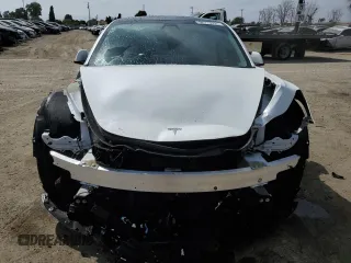 2022 Tesla Model 3 Long Range z VIN 5YJ3E1EB3NF174314, wystawiony jako Copart lot #52713325 z przebiegiem 27 646 mil mil oraz Szkoda całkowita • Salvage title. Historia ofert i sprzedaży dostępna na DreamBid. Obrazek 5.