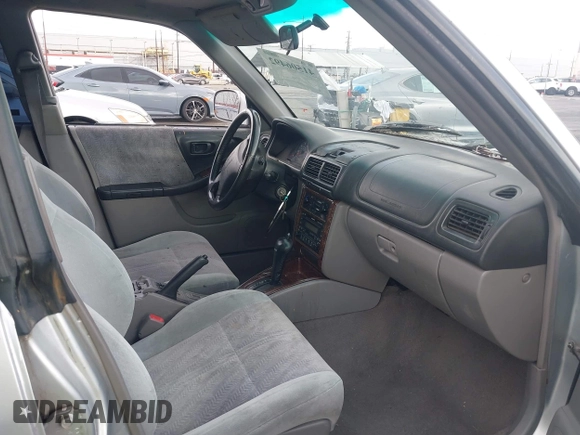 2002 Subaru Forester S w/Premium Pkg with VIN JF1SF65622H713337, listed as a IAAI auction lot 41506492 with 201,188 mi miles. Bid and sale history available at carsss.com. Image 5.