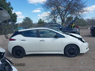 2023 Nissan LEAF SV Plus with VIN 1N4CZ1CV4PC557184, listed as a IAAI auction lot 42034042 with 12,037 mi miles and . Bid and sale history available at DreamBid. Image 13.