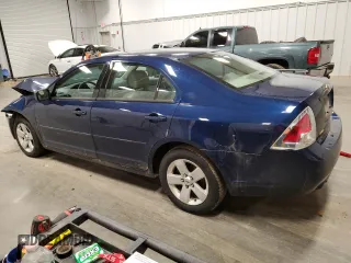 2007 Ford Fusion SE with VIN 3FAHP07177R109097, listed as a Copart auction lot 52411695 with 82,251 mi miles and Salvage Title. Bid and sale history available at DreamBid. Image 2.