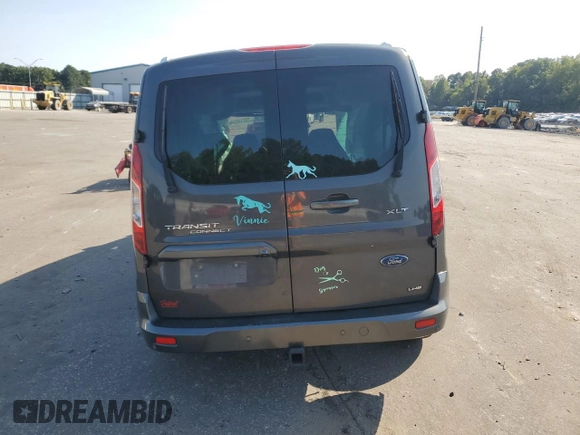 2021 Ford Transit Connect XLT with VIN NM0GS9F27M1504144, listed as a Copart auction lot 70214034 with 45,827 mi miles and Salvage title. Bid and sale history available at DreamBid. Image 6.