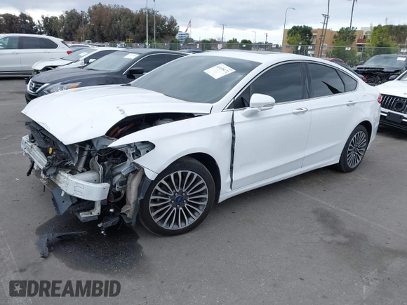 2018 Ford Fusion Titanium with VIN 3FA6P0RU0JR117158, listed as a IAAI auction lot 41435172 with 98,390 mi miles and . Bid and sale history available at DreamBid. Image 2.