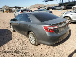 2012 Toyota Camry XLE z VIN 4T1BD1FK8CU048172, wystawiony jako Copart lot #51941205 z przebiegiem 186 001 mil mil oraz Szkoda całkowita • Salvage title. Historia ofert i sprzedaży dostępna na DreamBid. Obrazek 2.