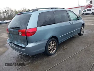 2005 Toyota Sienna XLE with VIN 5TDZA22C95S386560, listed as a IAAI auction lot 41943555 with 230,708 mi miles and . Bid and sale history available at DreamBid. Image 4.