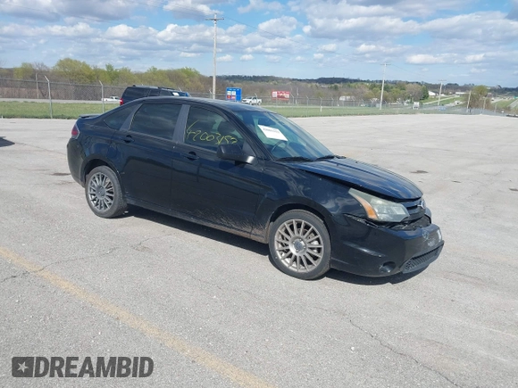 2010 Ford Focus SES with VIN 1FAHP3GN7AW291389, listed as a IAAI auction lot 42003153 with 151,987 mi miles. Bid and sale history available at carsss.com. Image 1.
