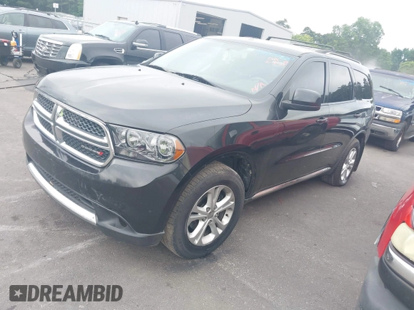 2012 Dodge Durango SXT with VIN 1C4RDJAG4CC314444, listed as a IAAI auction lot 42535630 with 205,494 mi miles and . Bid and sale history available at DreamBid. Image 17.