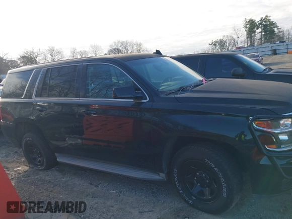 2015 Chevrolet Tahoe Commercial z VIN 1GNLC2EC4FR535329, wystawiony jako IAAI lot #41643486 z przebiegiem 185 326 mil mil oraz . Historia ofert i sprzedaży dostępna na DreamBid. Obrazek 13.