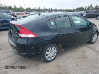 2010 Honda Insight LX with VIN JHMZE2H58AS014396, listed as a IAAI auction lot 42097224 with 167,505 mi miles and . Bid and sale history available at DreamBid. Image 4.