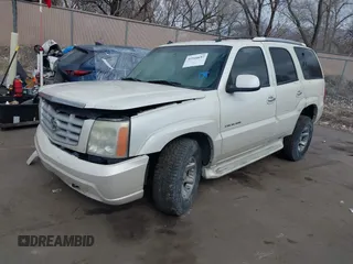 2003 Cadillac Escalade z VIN 1GYEK63N53R304400, wystawiony jako IAAI lot #41544697 z przebiegiem 207 913 mil mil oraz . Historia ofert i sprzedaży dostępna na DreamBid. Obrazek 2.