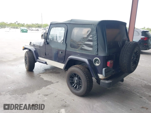 1999 Jeep Wrangler Sport with VIN 1J4FY19S1XP402974, listed as a IAAI auction lot 41659511 with 152,024 mi miles. Bid and sale history available at carsss.com. Image 3.