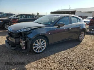 2014 Mazda 3 S Grand Touring with VIN JM1BM1M30E1217864, listed as a Copart auction lot 63856755 with 75,489 mi miles and Salvage title. Bid and sale history available at DreamBid. Image 1.
