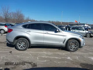 2018 BMW X6 xDrive35i with VIN 5UXKU2C50J0X51275, listed as a IAAI auction lot 41421704 with 165,052 mi miles. Bid and sale history available at carsss.com. Image 13.